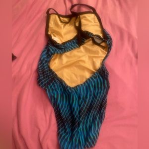 Brand new without tags waterpro training suit, size 32